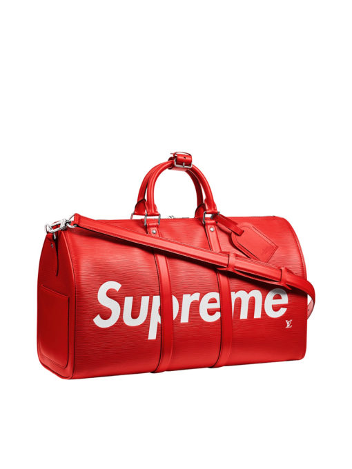 LOUIS VUITTON X SUPREME. Original Quality Bag including gift box, care book, dust bag, authenticity card. Epi leather, introduced 1985, became the first permanent leather collection of Louis Vuitton, and is tanned with plant extracts before dying. The process allows for colors as vibrant as this shade of red to stand out. Introduced in 1930, the Louis Vuitton Keepall was one of the first bags ever made by Louis Vuitton that is still in production today. Supreme debuted in 1994,140 years after Louis Vuitton was founded in Paris. Louis Vuitton’s collaboration with Supreme, dubbed the “coolest streetwear brand in the world right now” by GQ, was first shown at Paris Men’s Fashion Week in January 2017. Both stylish and practical, the Louis Vuitton x Supreme Keepall Bandouliere 45 is the perfect personification of classic LV and the highly sought after Supreme brand of cool. | CRIS&COCO Authentic Quality bags and Accessories