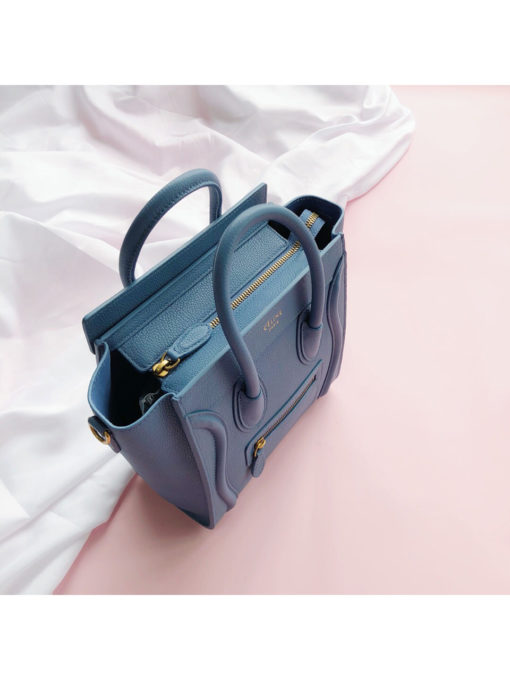 CELINE Luggage Nano. Original Quality Bag including gift box, care book, dust bag, authenticity card.  Nano luggage bag in calfskin with leather handles, a removable shoulder strap, and a zip closure. The bag has a zipped outer pocket on the front. | CRIS&COCO Authentic Quality bags and Accessories