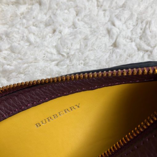 BURBERRY The Leather Barrel Bag. Original Quality Bag including gift box, care book, dust bag, authenticity card. A cylindrical micro bag in block-color leather. Use the military-inspired belt strap to carry it crossbody or on the shoulder. | CRIS&COCO Authentic Quality Designer Bag and Luxury Accessories