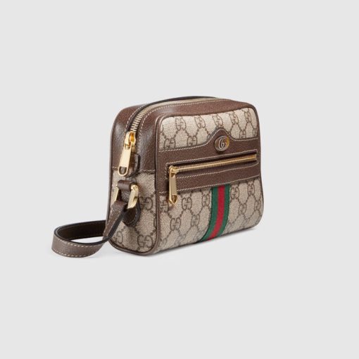 GUCCI Ophidia Small GG Supreme Camera Crossbody Bag. Original Quality Bag. Authentic Style. Authentic Packaging. Original Quality Dust Bag. Gucci camera crossbody bag in GG Supreme canvas, a material with low environmental impact. Leather trim with signature web accents. Adjustable shoulder strap, 65.0cm drop. Zip top closure. Exterior, front zip pocket. Interior, one zip pocket. One slip pocket. Founded in Florence in 1921, Gucci is one of the world's leading luxury fashion brands, with a renowned reputation for creativity, innovation and exceptional craftsmanship. | CRIS&COCO Authentic Quality Designer Bag and Luxury Accessories