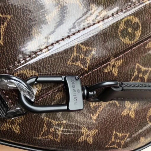 LOUIS VUITTON Keepall Bandoulière 50. Original Quality Bag. Authentic Style. Genuine Calf Leather. Metal Hardware. Authentic Packaging. Original Quality Dust Bag. This iconic Keepall Bandoulière 50, the original soft travel bag, is revisited for this special edition in key materials from the Fall-Winter 2019 Men's Fashion Show. Here, it comes Monogram Coated Canvas and features natural cowhide-leather trim, textile handles and a removable shoulder strap embossed with the House signature. | CRIS&COCO | High Quality Designer Handbags