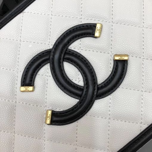 CHANEL Vanity Case Shoulder Bag and Crossbody. Original, authentic quality bag. Genuine Calf Leather. Metal Hardware. Authentic Packaging. Original Quality Dust Bag. Authenticity Card. This iconic CHANEL bag was first released for the Spring-Summer 2016 Collection. Iterations are dropped every new season. This bag is in beautiful grained calfskin leather with brushed metal-tone hardware. It features an embroidered CC stitched logo, a single flat top handle, two hanging clochettes. Its inside is lined with calfskin leather. | CRIS&COCO | High quality designer bags and luxury accessories