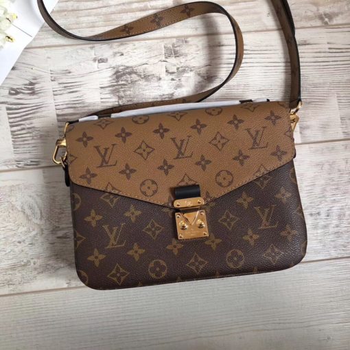 LOUIS VUITTON Pochette Métis Monogram Canvas Crossbody Bag. Original Quality Bag. Authentic monogram coated canvas. Gold-toned Hardware. LOUIS VUITTON Sales Box and Dust Bag. Booklet, Authenticity Card, Payment Slip. Elegance is personified in the petite shape of the Pochette Métis. Made of supple Monogram canvas, its compact dimensions open up to reveal many useful pockets and compartments. | CRIS&COCO | High quality designer bags and authentic luxury