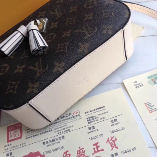 LOUIS VUITTON Saintonge Monogram Canvas Crossbody Bag. Original Quality Bag. Authentic calf leather trim and monogram coated canvas. Gold-toned Hardware. LOUIS VUITTON Sales Box and Dust Bag. Booklet, Authenticity Card, Payment Slip. Monogram canvas and smooth calfskin combine in the Saintonge, a compact bag with a youthful vibe. The leather lends contrast and volume to the design, and the tassels are a playful touch. With its top handle and long strap, the bag can be worn with top handle or as crossbody and shoulder bag. | CRIS&COCO | High quality designer bags and authentic luxury