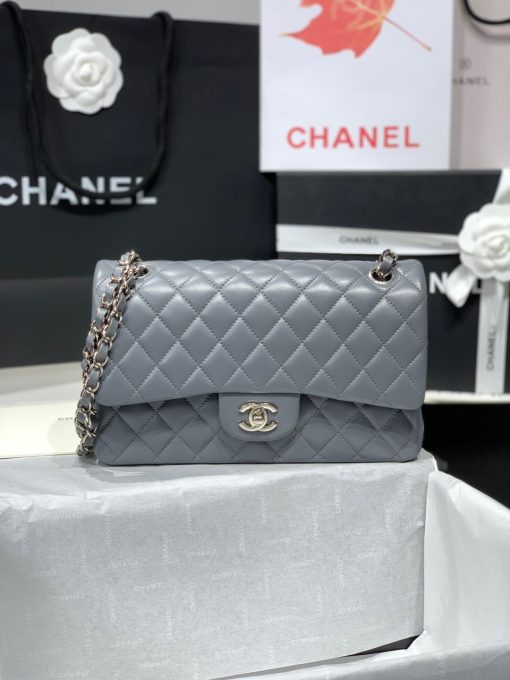 CHANEL Medium Classic Flap Bag. Original Quality Bag. CHANEL Sales Box and Dust Bag. Booklet, Authenticity Card, Payment Slip. Whether you’re a young celeb looking to carry a flashy mini bag in front of the paparazzi or a corporate maven looking for a roomy day bag that announces that you’ve arrived. Many sizes, colors and variations on the Classic Flap mean that there’s likely a version that will suit your purposes. The bags tend to hold their value well for years. | CRIS&COCO | High quality designer bags and authentic luxury