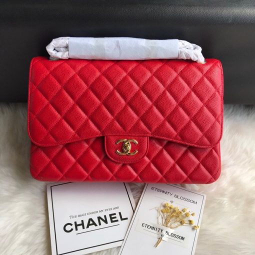 CHANEL 2.55 Classic Diamond Quilted Leather Double Flap Bag. Original Quality Bag. Authentic calfskin. Metal Toned Hardware. CHANEL Sales Box and Dust Bag. Booklet, Authenticity Card. The name 2.55 refers to the release of the bag in February 1955. It had a rectangular turn-lock which was called the Mademoiselle Lock. The 'CC' lock was introduced to the Classic Flap Bags only in the 1980s by designer Karl Lagerfeld. The all chain strap was replaced with the iconic leather interwoven chain link strap. | CRIS&COCO Authentic Quality Designer Bags and Luxury Accessories