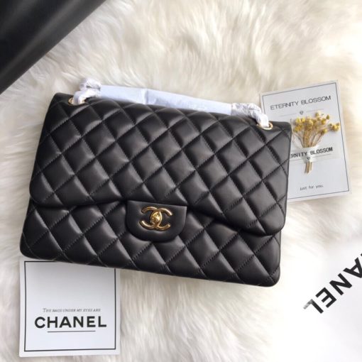 CHANEL 2.55 Classic Diamond Quilted Leather Double Flap Bag. Original Quality Bag. Authentic calfskin. Metal Toned Hardware. CHANEL Sales Box and Dust Bag. Booklet, Authenticity Card. The name 2.55 refers to the release of the bag in February 1955. It had a rectangular turn-lock which was called the Mademoiselle Lock. The 'CC' lock was introduced to the Classic Flap Bags only in the 1980s by designer Karl Lagerfeld. The all chain strap was replaced with the iconic leather interwoven chain link strap. | CRIS&COCO Authentic Quality Designer Bags and Luxury Accessories