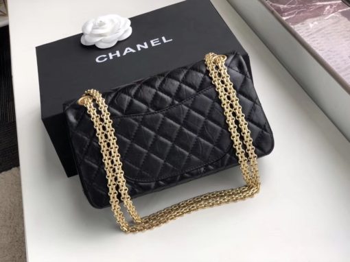 CHANEL 2.55 Reissue Quilted Leather Double Flap Bag | Original Quality Bag. Authentic aged calfskin. Aged Metal Toned Hardware. CHANEL Sales Box and Dust Bag. Booklet, Authenticity Card. In February 2005, Karl Lagerfeld re-made the 2.55, precisely as Coco Chanel had made in 1955, in commemoration of the 50th anniversary of the 2.55. It came to be known as the Reissue. As an homage to Coco's upbringing in an orphanage, the 2.55 was outfitted with a double chain, reminding of the dangled keychains of her caretakers. The brownish-red color of the inside represents the color of the children's uniforms. A zipped compartment on the inside of the front flap was added where Coco would hide her love letters. The back outside flap of the 2.55 Reissue marks where Coco would stash her cash. | CRIS&COCO Authentic Quality Designer Bags and Luxury Accessories