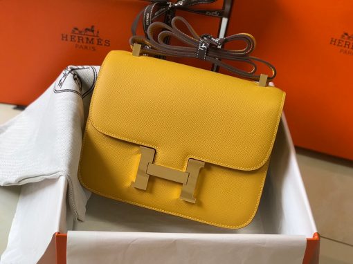 HERMÈS Constance Shoulder Bag. Authentic Quality Bag with literature, dust bag, box and authenticity card. Designed by in-house designer Catherine Chaillet, and named after her daughter, the Hermes Constance Bag is pure elegance. It features sleek lines, a fully adjustable strap, and the iconic “H” clasp. The Constance is a simply, elegant shoulder bag with a long leather strap that can be doubled. | CRIS&COCO Authentic Quality bags and Accessories
