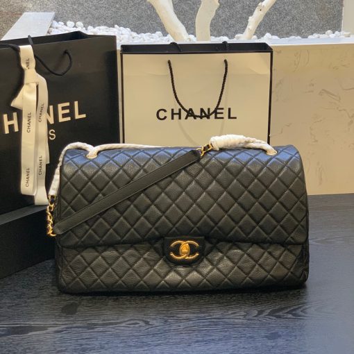 CHANEL XXL Runway Travel Classic Flap Bag. Authentic Quality Bag with literature, dust bag, fabric flower, and authenticity card. This Chanel Classic Maxi Flap Bag is crafted from black caviar leather and finished with silver hardware. The bag features the iconic cc turncock front closure and is lined in the classic Bordeaux leather lining. The bag features a zip pocket under the flap, black pocket, and interior 2 pockets. | CRIS&COCO Authentic Quality Designer Bags and Luxury Accessories