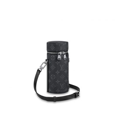 LOUIS VUITTON Bottle Holder. Original Quality Holder including gift box, care book, dust bag, authenticity card. This elegant bottle holder makes the ideal accompaniment for a picnic, an outdoor rendezvous, or playing sports. Embellished with striking Monogram Eclipse canvas, this stylish gift can be used to store small bottles of wine, water, or soda safely. An adjustable strap ensures it can be carried cross-body, over the shoulder, or like a backpack. | CRIS&COCO Authentic Quality Designer Bags and Luxury Accessories