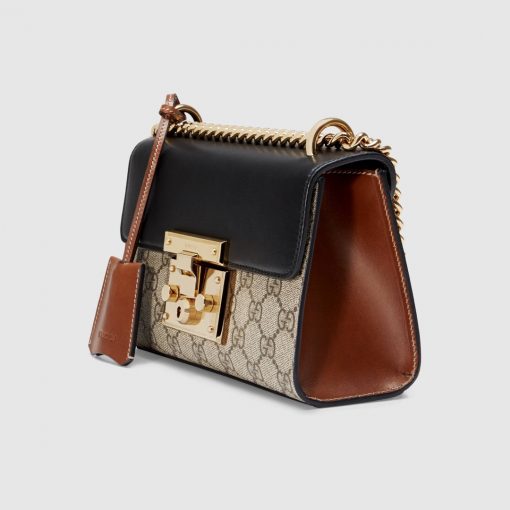 GUCCI Padlock GG Shoulder Bag. Original Quality Bag with literature, dust bag, gift box, and authenticity card. Crafted from smooth calf leather and the label's iconic GG-printed canvas, the Padlock shoulder bag from Gucci is an investment piece that will prove its worth. The bag is given a classic, glamorous finish with gold-tone hardware for the ultimate sophisticated touch. Carry it over your shoulder as a crossbody or in the crook of your arm. | CRIS&COCO Authentic Quality bags and Accessories
