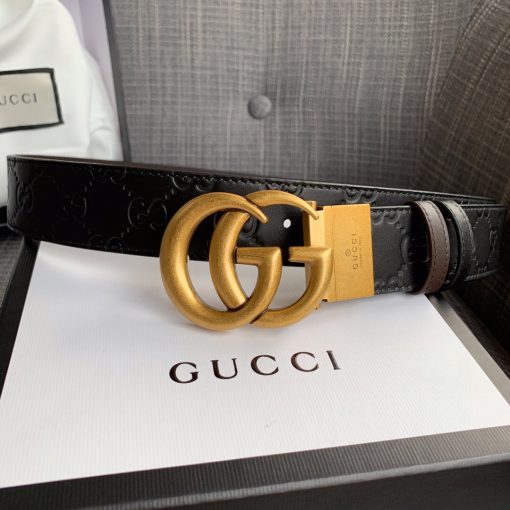 GUCCI Signature GG Logo Leather Belt. Original Quality GUCCI Signature GG Logo Leather Belt including gift box, care book, dust bag, authenticity card. Gucci’s leather Signature belt is subtly patterned with the debossed rhombus motif from the house’s archives. It features a metal-tone metal GG logo plaque and is finished with smooth hand-lacquered edges.| Cris and Coco. Best Quality Designer Bags and Luxury Accessories
