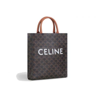 CELINE Vertical Cabas Tote in Triomphe Canvas and Calfskin. Original Quality Bag including gift box, literature, dust bag, authenticity card. The Triomphe bag wasn’t really loved in the beginning, but its gaining traction and fame. The story started with the CELINE Triomphe bag, a magnificent bag that’s named after the Arc the Triomphe. A new chapter has started, CELINE has completed an entire collection of the Triomphe line. It includes a tote bag, bucket bag, camera bag, drawstring bag, and a Boston bag. All of these styles are made from Triomphe canvas and with calfskin trimming. | CRIS AND COCO | Authentic Quality Designer Bags and Luxury Accessories