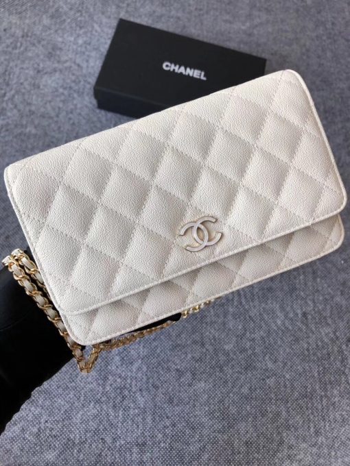 CHANEL Classic Wallet on Chain. Authentic Quality Wallet, including gift box, literature, dust bag, authenticity card. Classic and elegant, a Chanel bag is a fashion statement to your outfit, as seen in this caviar leather flap wallet on chain. Featuring a diamond quilted finish, metal-tone hardware, a foldover top, an internal zipped pocket, an internal slip pocket, an internal logo stamp, a back slip pocket, tortoiseshell details, and a CC turn-lock fastening. | CRIS AND COCO Authentic Quality Designer Bags and Luxury Accessories