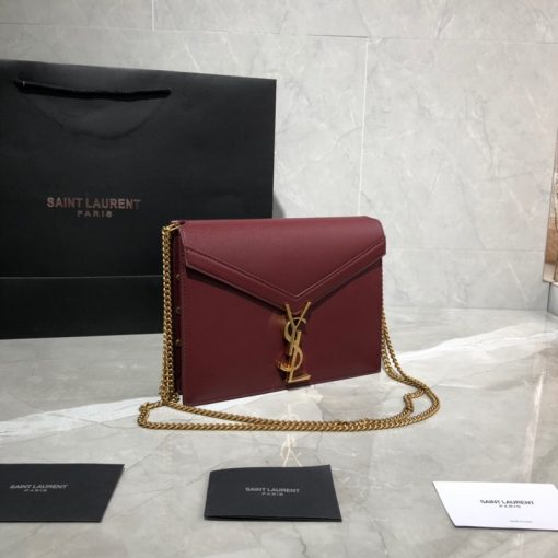 SAINT LAURENT Cassandra Monogram Chain Bag. Original Quality Bag including gift box, literature, dust bag, authenticity card. This Cassandra shoulder bag is a masterclass in refined elegance. Crafted in calf leather, it's punctuated with metal-tone hardware including purse feet to keep it in pristine condition. Whether you wear it over one shoulder or carried in-hand is up to you. | Cris and Coco Authentic Quality Luxury Bags and Accessories