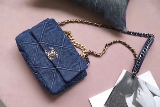 Chanel '19' Flap Bag in Blue Denim 2020. Original Quality Bag including gift box, care book, dust bag, authenticity card. This gorgeous Chanel '19' Flap Bag in Blue Denim is the most sought after bag this year by CHANEL. Gorgeous and so on-trend. Guaranteed authentic and comes with proof of purchase! Please be advised that this is the Larger size, not the medium. Sold out globally. This style is no longer available from Chanel and discontinued in denim. A great investment piece. | CRIS&COCO Authentic Quality Designer Bag and Luxury Accessories