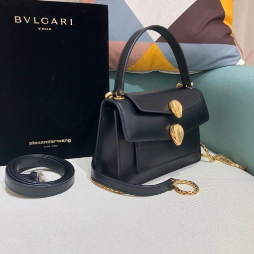 ALEXANDER WANG x BVLGARI Belt Bag. Original Quality Bag including gift box, care book, dust bag, authenticity card. The belt bag is a dream to style, as it features two detachable straps and a detachable handle and can be worn on the waist, as a crossbody bag, as a clutch or over the shoulder. BVLGARI and ALEXANDER WANG have reprised Serpenti Through The Eyes of ALEXANDER WANG for 2020, with the exciting addition of two brand new bags. While the two in-demand fashion houses may not reveal themselves to be the most obvious collaborators at a superficial glance, they have nonetheless merged to produce their latest capsule collection infusing allure with innovation. | Cris and Coco Authentic Quality designer bags and luxury accessories.