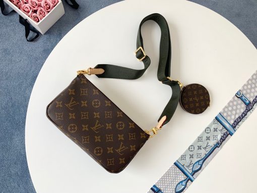 LOUIS VUITTON Monogram Multi Pochette Accessories. Authentic Quality Bag with literature, dust bag and authenticity card. The hottest bag of the season, the LV Monogram Multi Pochette features a hybrid of Pochettes in varying sizes coated in LV’s monogram canvas leather. The Pochette Accessoires, Mini Pochette Accessoires, and round coin purse also come with a removable Louis Vuitton inscribed Khaki strap and gold-tone chain. | CRIS&COCO Authentic Quality bags and Accessories