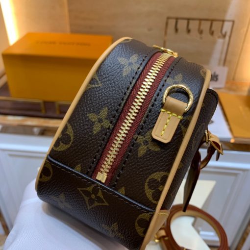 LOUIS VUITTON Deauville Mini Bag. Original Quality Bag including gift box, care book, dust bag, authenticity card. For Fall-Winter 2020, Nicolas Ghesquière introduces the Deauville Mini handbag. This adorable camera bag in Monogram canvas with natural leather trim will bring a touch of retro chic to any look. Compact and lightweight, it has an adjustable leather strap for shoulder and cross-body carry. | CRIS&COCO Authentic Quality Designer Bags and Luxury Accessories