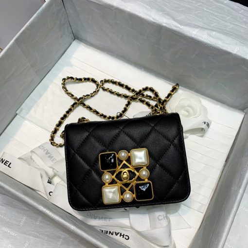 CHANEL Small Flap Bag with Crystal Pearls and Resin. Original Quality Bag including gift box, care book, dust bag, authenticity card. Chanel has introduced the Small Flap Bag in a bejeweled variant at Fall-Winter 2020/21 season. The bag is subtly blingy featuring faux pearls and Chanel’s Gripoix (poured glass jewels) on the clasp. | CRIS&COCO Authentic Quality Designer Bags and Luxury Accessories