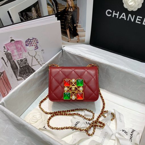 CHANEL Small Flap Bag with Crystal Pearls and Resin. Original Quality Bag including gift box, care book, dust bag, authenticity card. Chanel has introduced the Small Flap Bag in a bejeweled variant at Fall-Winter 2020/21 season. The bag is subtly blingy featuring faux pearls and Chanel’s Gripoix (poured glass jewels) on the clasp. | CRIS&COCO Authentic Quality Designer Bags and Luxury Accessories