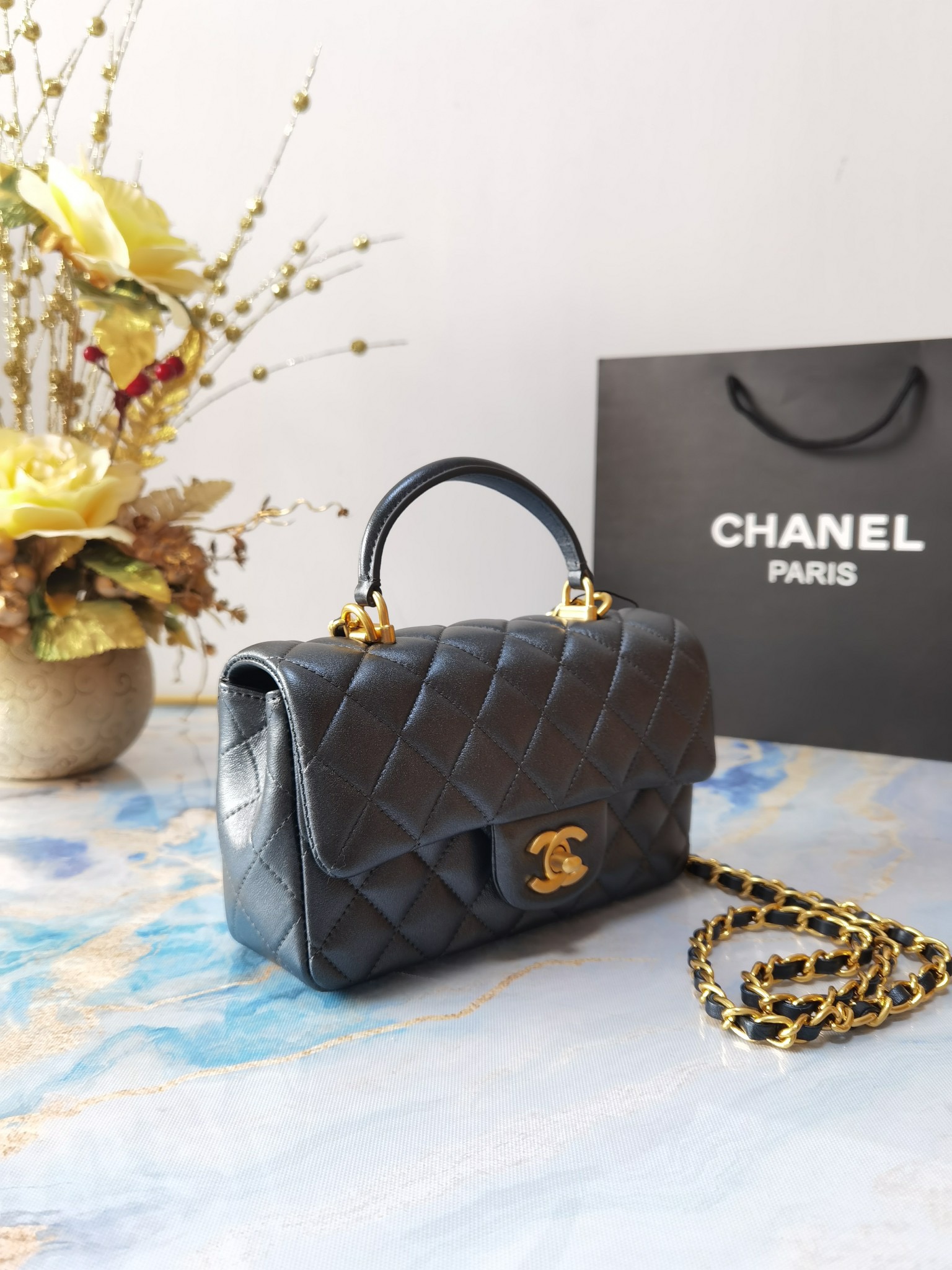 chanel flap bag with top handle leather