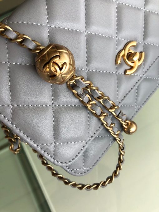 CHANEL Classic WOC Golden Knob Bag. Original Quality Bag including gift box, care book, dust bag, authenticity card. Chanel lends a signature flair to this Classic WOC bag with iconic symbols and construction. Crafted in lambskin, gold-tone hardware, and iconic CC pair together to create the ultimate memorable finish. Open this sweet little quilted bag to find multiple zip and slip pockets for keeping your cards and essentials secure so you can have more fun! | CRIS&COCO Authentic Quality Designer Bags and Luxury Accessories