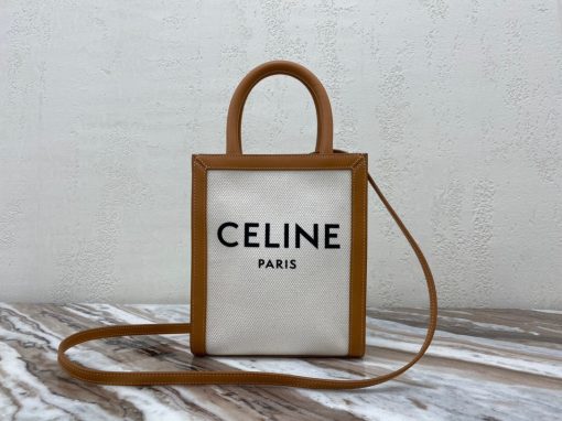 CELINE Cabas Triomphe Mini. Original Quality Bag including gift box, care book, dust bag, authenticity card. The Triomphe bag wasn’t really loved in the beginning, but its gaining traction and fame. The story started with the CELINE Triomphe bag, a magnificent bag that’s named after the Arc the Triomphe. A new chapter has started, CELINE has completed an entire collection of the Triomphe line. It includes a tote bag, bucket bag, camera bag, drawstring bag, and a Boston bag. All of these styles are made from Triomphe canvas and with calfskin trimming. | CRIS&COCO Authentic Quality Designer Bags and Luxury Accessories