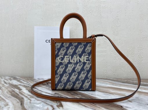 CELINE Cabas Triomphe Mini. Original Quality Bag including gift box, care book, dust bag, authenticity card. The Triomphe bag wasn’t really loved in the beginning, but its gaining traction and fame. The story started with the CELINE Triomphe bag, a magnificent bag that’s named after the Arc the Triomphe. A new chapter has started, CELINE has completed an entire collection of the Triomphe line. It includes a tote bag, bucket bag, camera bag, drawstring bag, and a Boston bag. All of these styles are made from Triomphe canvas and with calfskin trimming. | CRIS&COCO Authentic Quality Designer Bags and Luxury Accessories