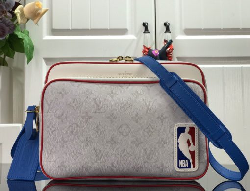 LOUIS VUITTON with NBA NIL Messenger. Original Quality Bag including gift box, care book, dust bag, authenticity card. Part of Virgil Abloh’s collaboration with the NBA, the Nil Messenger is made from Monogram canvas and features a leather NBA logo patch on its side. The bag’s adjustable leather strap ensures carrying comfort while two outside pockets and a back pocket give quick-and-easy access to belongings. | CRIS&COCO Authentic Quality Designer Bags and Luxury Accessories