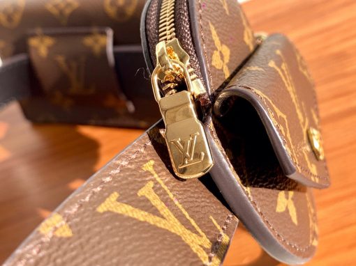 LOUIS VUITTON Daily Multi Pocket Belt. Original Quality Belt including gift box, care book, dust bag, authenticity card. Functional design and impeccable craftsmanship blend seamlessly in the Daily Multi Pocket 30mm Belt. Inspired by the utility trend, this striking piece features removable pouches plus a key holder for maximum practicality. Finished in iconic Monogram canvas, the belt is topped with a gold-colour ardillon buckle, engraved with the Monogram pattern for a refined touch. If you are looking for a utilitarian piece to hold all your purely essential items, this belt is the perfect option. It looks amazing, and it is a convenient alternative for toting around your necessary items. Talk about hands-free! | CRIS&COCO Authentic Quality Designer Bags and Luxury Accessories