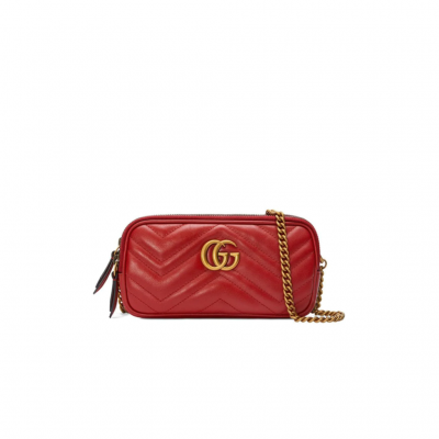 Gucci GG Marmont Mini Chain Bag. The GG Marmont Mini Chain Bag is covered with chevron leather with heart on the back. This bag has a softly structured slim shape and three zippered compartments. The ultra-chic GG logo crafted on the front in antique gold hardware. The antique gold mixed a bit of vintage effect to it. Moiré and microfiber lining with suede like finish. Two card slots. Three zip compartments. Chain strap with 60cm drop. The bag might be small but it’s super cute especially when you sling it on your shoulder.| CRIS&COCO Authentic Quality Designer Bags and Luxury Accessories