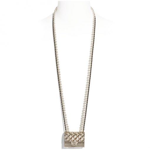 CHANEL Long Necklace. This CHANEL Long Necklace- Gold, Black & Pearly White is part of the Spring-Summer 2021 fashion collection. The artistry and craftsmanship of the House of CHANEL.| CRIS&COCO Authentic Quality Designer Bags and Luxury Accessories