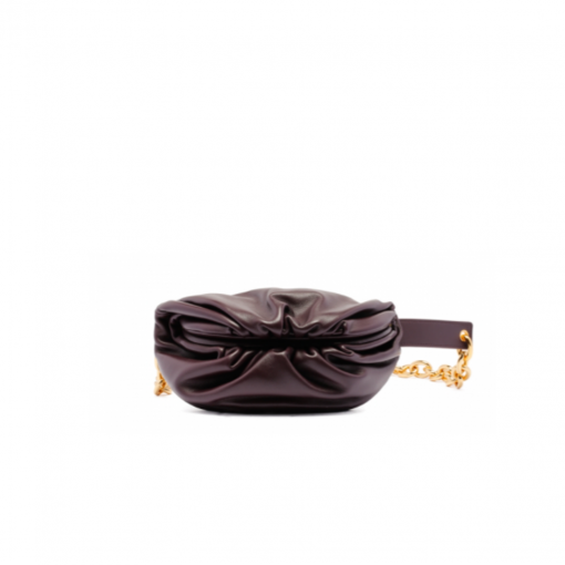 BOTTEGA VENETA Belt Chain Pouch. Fashion can be functional too and this Belt Chain pouch from Bottega Veneta is proof of that. It's perfect for days when you want to go hands-free. This smaller pouch in soft leather with one main compartment inside, leather interior, metal frame fastening, adjustable chain strap with carabiner fastening. Can be worn as a belt bag or crossbody. | CRIS&COCO Authentic Quality Designer Bags and Luxury Accessories