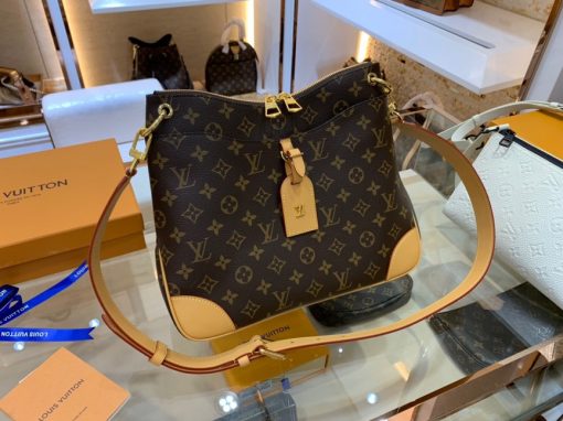 LOUIS VUITTON Odéon Shoulder Bag. Original Quality Bag including gift box, care book, dust bag, authenticity card. For Fall-Winter 2020, Louis Vuitton introduces the new Odéon, a stylish and functional shoulder bag. Reinforced leather corners and Monogram canvas give this practical bag a retro charm. An adjustable leather strap allows shoulder or crossbody carry. The two zipper pulls enable easy opening and closing, for quick access to belongings inside. | CRIS&COCO Authentic Quality Designer Bags and Luxury Accessories