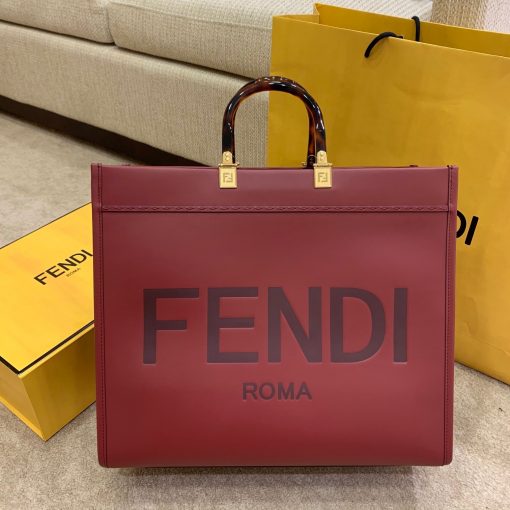 FENDI Sunshine Medium Tote. Original Quality Bag including gift box, care book, dust bag, authenticity card. Equipped with a spacious lined internal compartment, edges in tone on tone leather, and gold-finish hardware. Can be carried by hand or worn on the shoulder thanks to the two handles and detachable shoulder strap.| CRIS&COCO Authentic Quality Designer Bags and Luxury Accessories