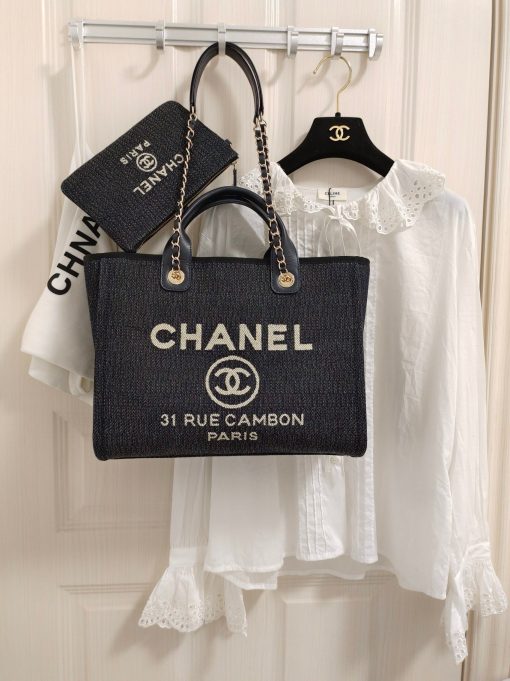 CHANEL Maxi Small Shopping Bag. Original Quality Bag including gift box, care book, dust bag, authenticity card. Luxuriously stylish and chic, this Chanel bag can carry all your essentials and other shopping items. This one is attention grabbing due to its large size and uniquely fun style. The logo comes in white lettering, proudly displaying that it’s a Chanel bag. The interwoven chained shoulder straps and the handles are two practical things you shouldn’t dare miss. Yes, it means you can carry it by the hand or over the shoulder. And just like your high-fashion denim jeans, this new oversized bag is made from denim, which means its durable, strong and easy to maintain. | CRIS&COCO Authentic Quality Designer Bag and Luxury Accessories