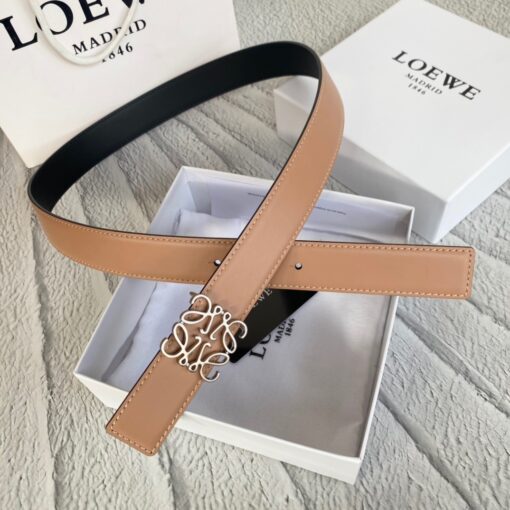 LOEWE Anagram Belt. Original Quality Belt including gift box, care book, dust bag, authenticity card. This belt is crafted in smooth calfskin with a LOEWE Anagram buckle. The label’s now-iconic Anagram – rendered in gleaming golden/silver/black tone metal – takes no lesser pride of place, though. Originally designed in 1970 in homage to the label’s founder and refreshed when Jw Anderson took over the reins, it’s an icon that points to the past and future at once.  | CRIS&COCO Authentic Quality Designer Bag and Luxury Accessories