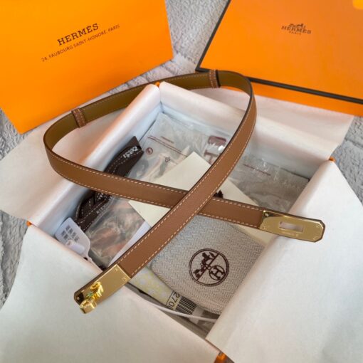 HERMÈS Kelly 18 Belt. Original Quality Belt including gift box, care book, dust bag, authenticity card. The variations of these one size fits all belts change the ways in which they can be worn by adjusting to all sizes while reinterpreting classic Hermes pieces with clever jewel clasps. Thanks to the clever sliding system, this one-size-fits-most belt may be worn at the waist or on the hips. | CRIS&COCO Authentic Quality Designer Bag and Luxury Accessories