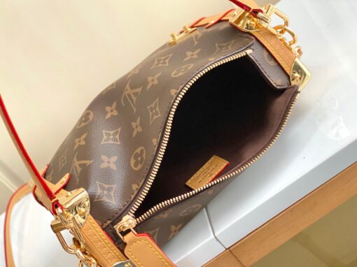 LOUIS VUITTON Side Trunk. Original Quality Bag including gift box, care book, dust bag, authenticity card. Returning to the House’s trunkmaking beginnings, Nicolas Ghesquière creates the Side Trunk PM handbag in Monogram canvas with leather trim. What strikes the eye is the singularity of the leather zip tab fitted with the iconic S-lock and the reinforced metallic corners. The wide top handle is removable as is the thin leather shoulder strap. | CRIS&COCO Authentic Quality Designer Bags and Luxury Accessories