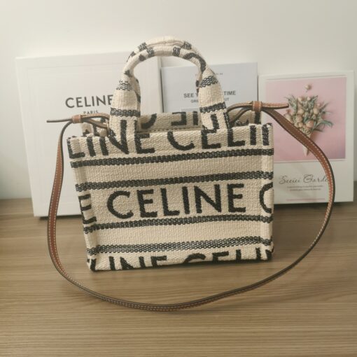 CELINE Small Cabas Thais In Textile. Original Quality Bag including gift box, care book, dust bag, authenticity card. Introducing a new Celine print, called ‘All Over’. These bags are adorned with the house’s logo all over the bag. They’re partly crafted from textile and calfskin. | CRIS&COCO Authentic Quality Designer Bag and Luxury Accessories