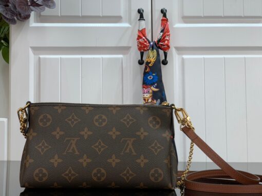 LOUIS VUITTON Pallas Clutch Bag. Original Quality Bag including gift box, care book, dust bag, authenticity card. It’s covered in Monogram Canvas and has multiple carry options like on your shoulder or even cross body. Make use of the leather strap or the golden chain. Use it as a Wallet on Chain bag, it’s just ideal for the evenings or when you want to carry a small but gorgeous handbag. Also, it matches to every casual outfit. This Clutch Bag is refined with golden color metallic pieces; it comes with zipped central compartment and an exterior front pocket. | CRIS&COCO Authentic Quality Designer Bags and Luxury Accessories