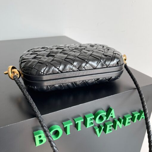 BOTTEGA VENETA Knot On Strap. Original Quality Bag including gift box, care book, dust bag, authenticity card. Bottega Veneta is famous for its intrecciato artistry, done with sophisticated artisanal techniques. And if we ever need the ‘perfect’ shoulder bag, take this Knot On Strap, a classic piece from the house. The design is timeless, but for the newest edition the fashion brand added an innovative glimmer accents, to give the knot bag a luxurious and contemporary edge. The woven panels of iconic Intrecciato and finished with shimmering ayers leather, carefully put together to give each separated piece a unique look and texture. | CRIS&COCO Authentic Quality Designer Bags and Luxury Accessories