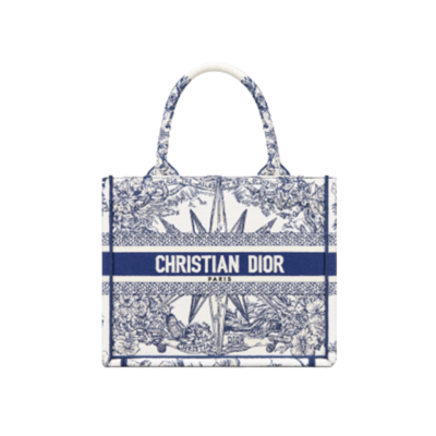 DIOR Small Book Tote. Original Quality Bag including gift box, care book, dust bag, authenticity card. This DIOR Tote is an original creation introduced by Dior's Creative Director, Maria Grazia Chiuri, and has become a staple of the Dior aesthetic. Designed to hold all the daily essentials, it is fully embroidered. Adorned with a Christian Dior Paris signature on the front, the small tote exemplifies the House's signature savoir-faire and may be carried by hand. | CRIS&COCO Authentic Quality Designer Bags and Luxury Accessories