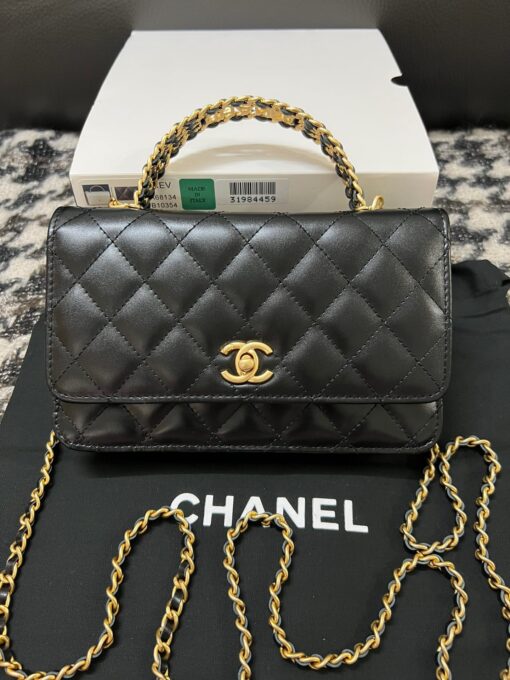 CHANEL Wallet On Chain With Signature Handle. Original Quality Bag including gift box, care book, dust bag, authenticity card. This is a seasonal bag from the Chanel Spring Summer 2022 SLG Collection. The design itself is so special about it. This bag is made with calfskin in diamond quilting. Then the center is refined with a vintage golden CC logo. The signature handle on the top to joints the woven leather strap. This bag comes with a back-pocket and a main compartment with card holders and chain pocket. | CRIS&COCO Authentic Quality Designer Bags and Luxury Accessories