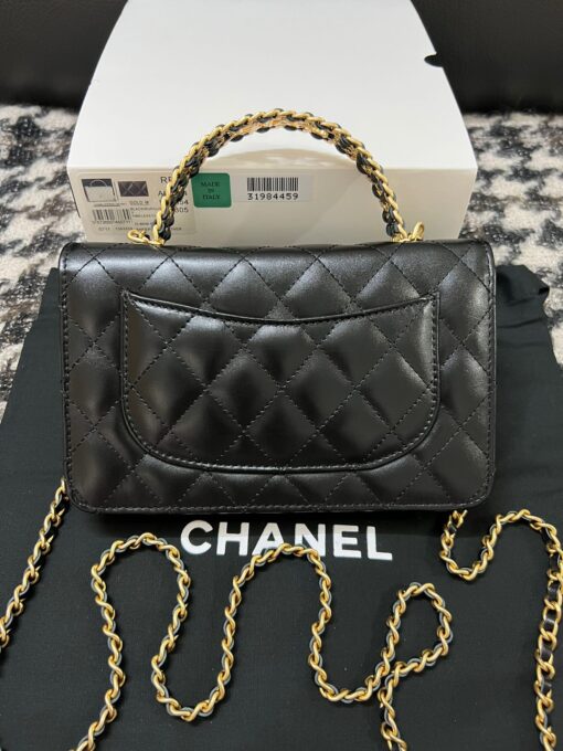 CHANEL Wallet On Chain With Signature Handle. Original Quality Bag including gift box, care book, dust bag, authenticity card. This is a seasonal bag from the Chanel Spring Summer 2022 SLG Collection. The design itself is so special about it. This bag is made with calfskin in diamond quilting. Then the center is refined with a vintage golden CC logo. The signature handle on the top to joints the woven leather strap. This bag comes with a back-pocket and a main compartment with card holders and chain pocket. | CRIS&COCO Authentic Quality Designer Bags and Luxury Accessories