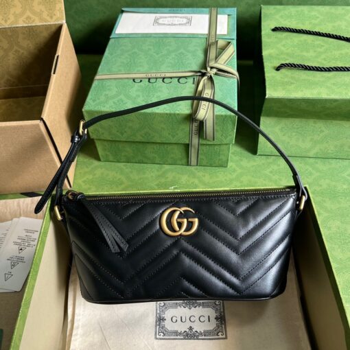 GUCCI GG Marmont Shoulder Bag. Original Quality Bag including gift box, care book, dust bag, authenticity card. The GG Marmont has become synonymous with the House, thanks to its recognizable matelassé fabric and Double G hardware. Continuously reinvented through the seasons, new shapes are introduced within this signature line, matching Gucci's contemporary vision. Presented here in chevron leather, it's further enriched with tonal details. | CRIS&COCO Authentic Quality Designer Bags and Luxury Accessories