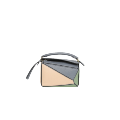 LOEWE Mini Puzzle Bag. Original Quality Bag including gift box, care book, dust bag, authenticity card. The Puzzle bag is the debut bag for LOEWE by Creative Director Jonathan Anderson. A cuboid shape and precise cutting technique create Puzzle’s distinctive geometric lines. This mini version is crafted in contrasting calfskins. | CRIS AND COCO Authentic Quality Luxury Accessories