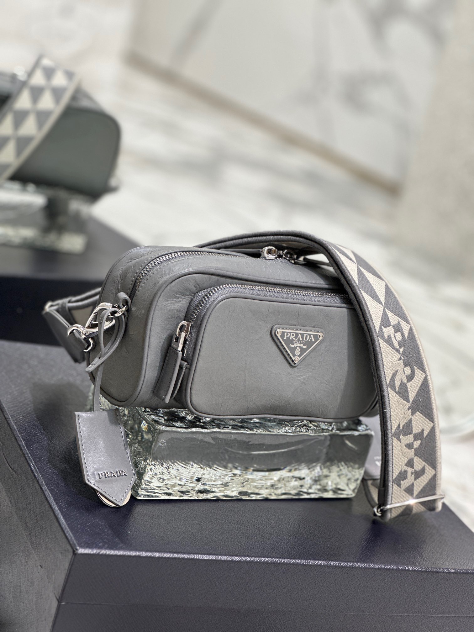 Prada Brique Logo-print Leather Shoulder Bag In Silver